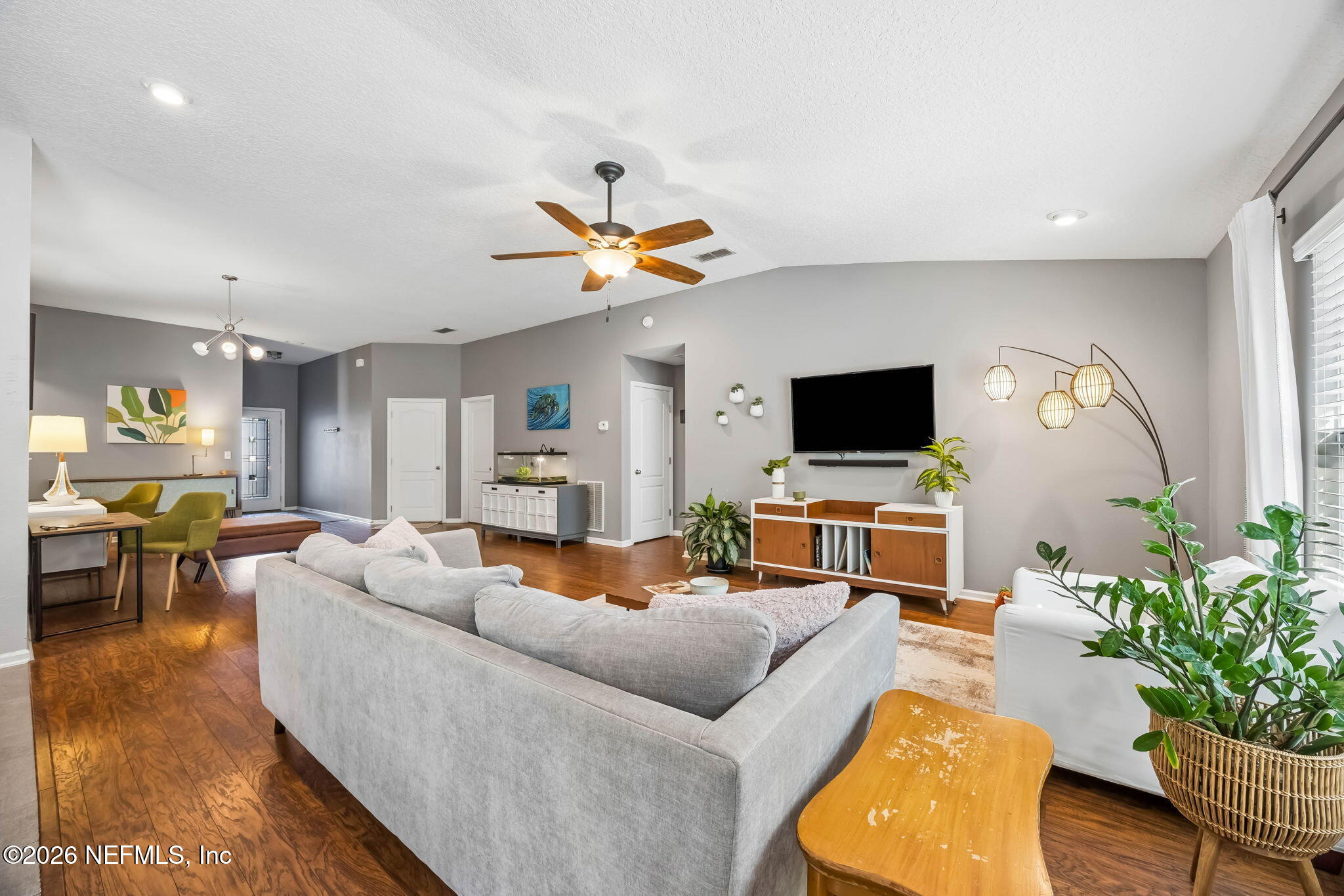1624 Indigo Street Fernandina Beach, FL 32034 - Photo 9 of 22 a living room with furniture and a flat screen tv