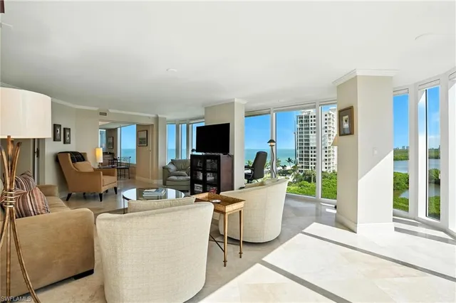 a living room with furniture and a couch