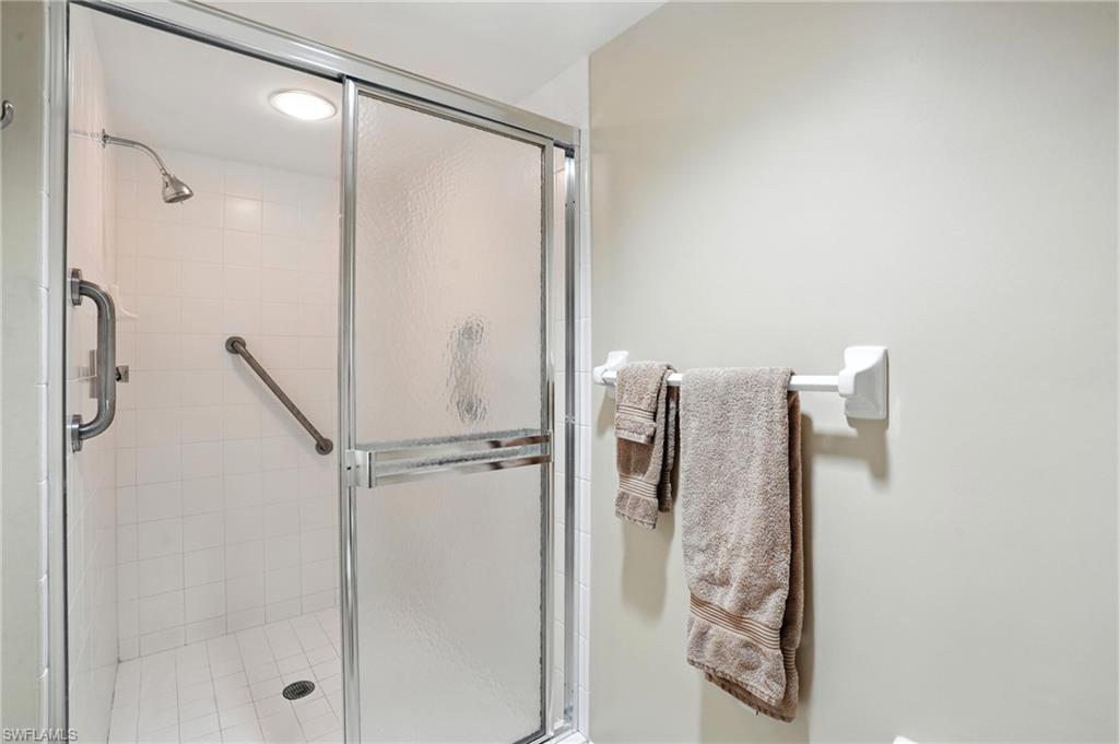 20 Seagate Drive, Unit 803 Naples, FL 34103 - Photo 30 of 40 Full bath with a shower stall