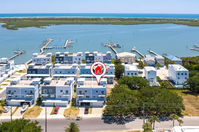 a view of a building with a yard