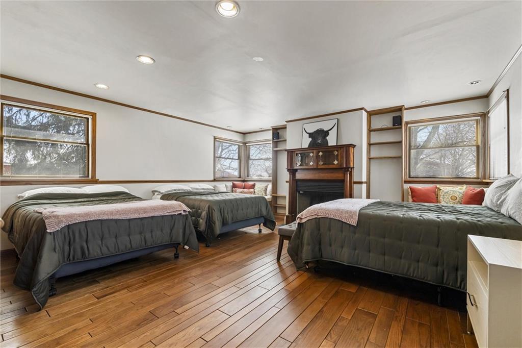 121 Brewer Road Saxonburg, PA 16056 - Photo 25 of 49 a bedroom with a bed and wooden floor