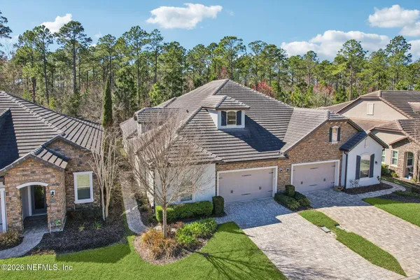 a view of a house with swimming pool