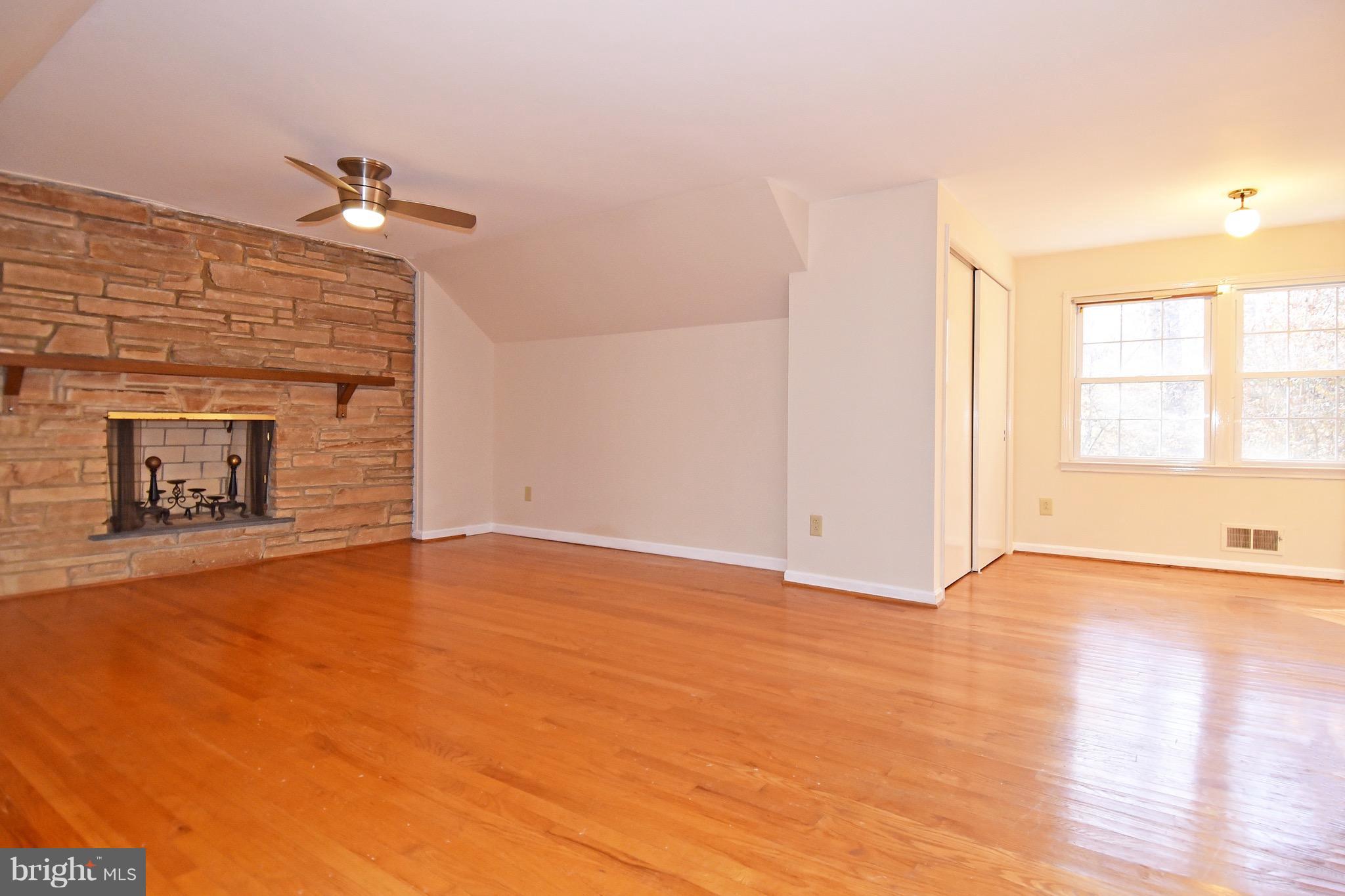 14911 West Auburn Road Accokeek, MD 20607 - Photo 22 of 30 a view of an empty room with wooden floor and a window
