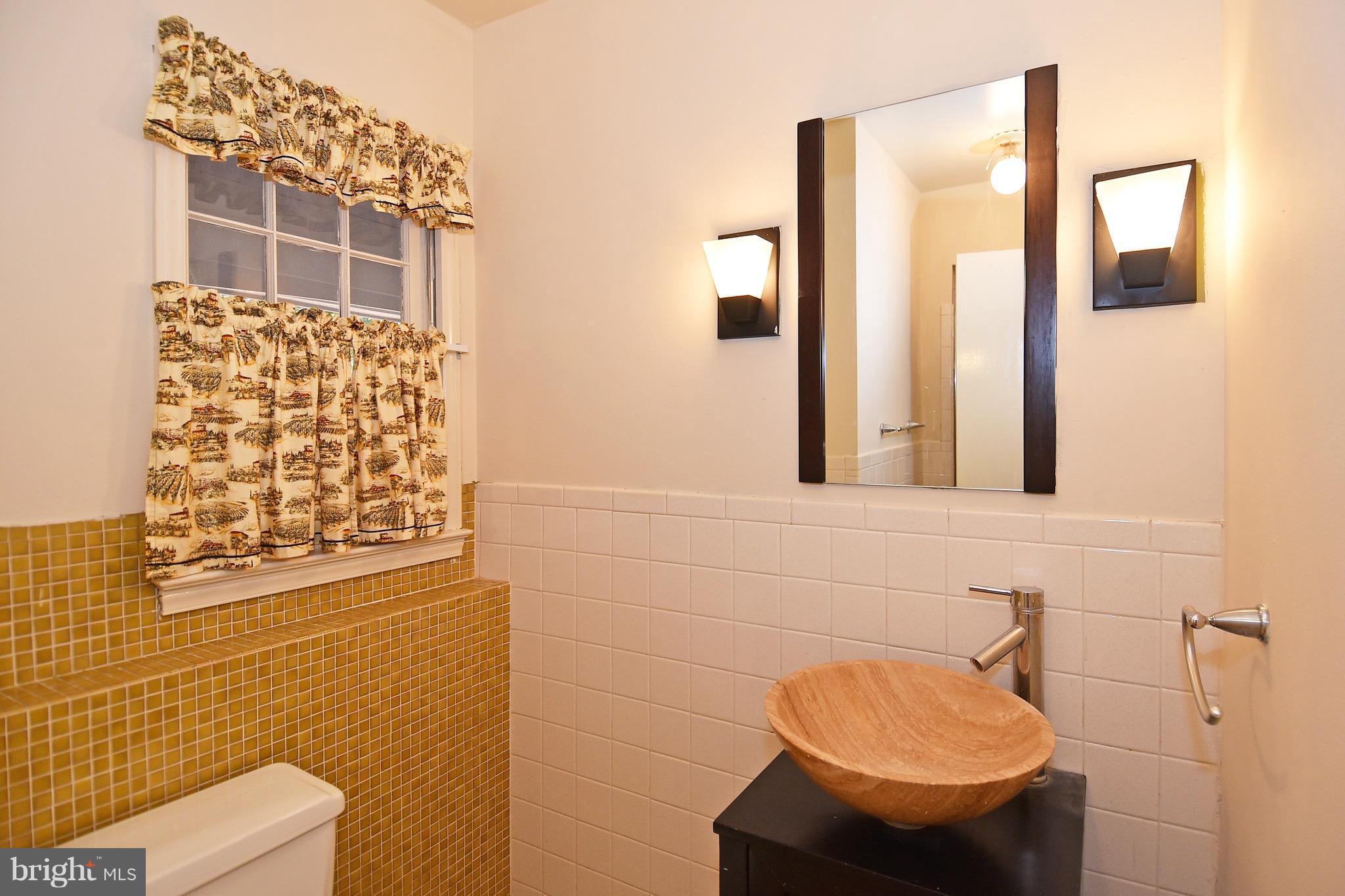 14911 West Auburn Road Accokeek, MD 20607 - Photo 26 of 30 a bathroom with a toilet and a sink