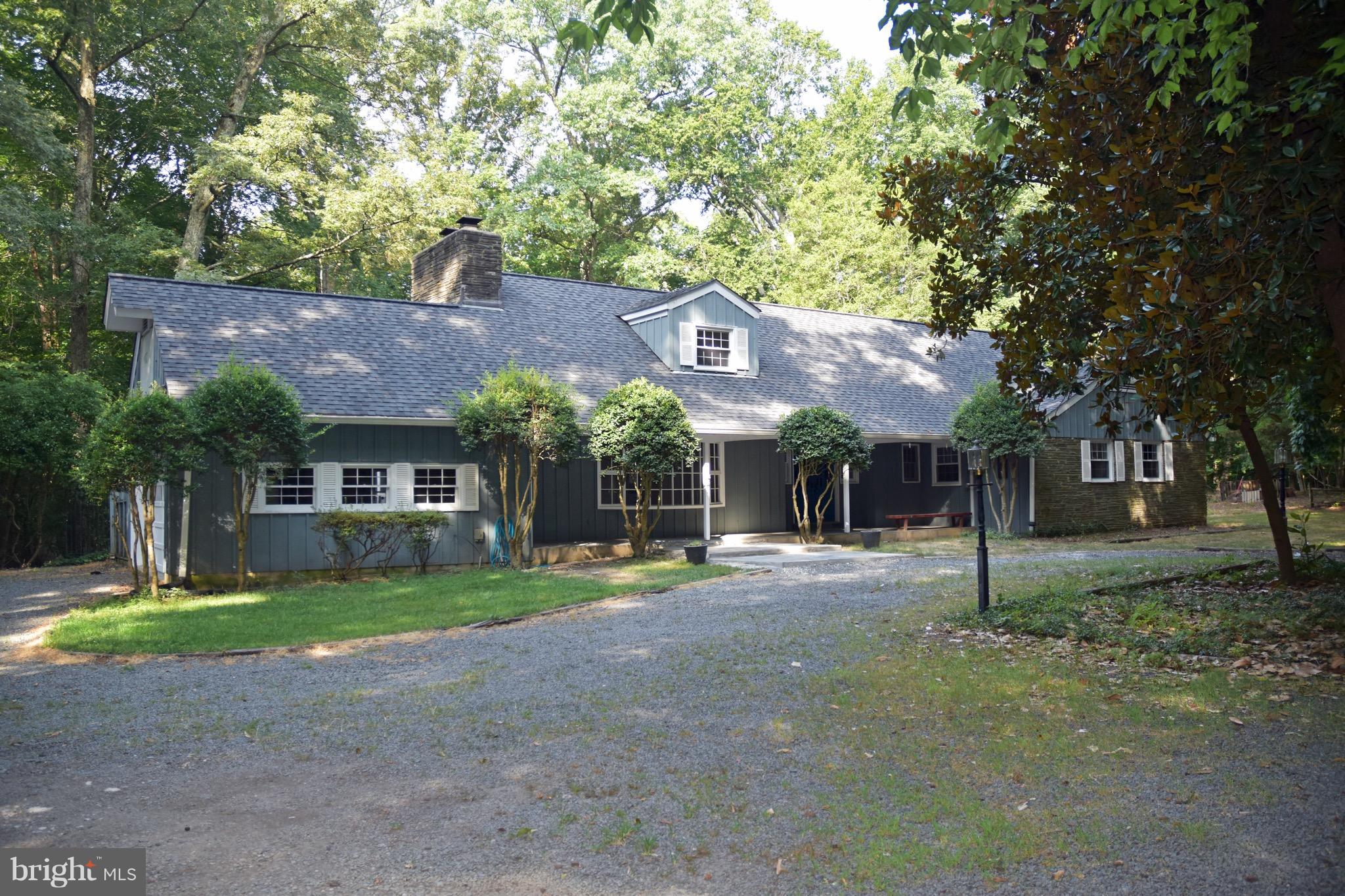 14911 West Auburn Road Accokeek, MD 20607 - Photo 4 of 30 a front view of a house with a yard and tree