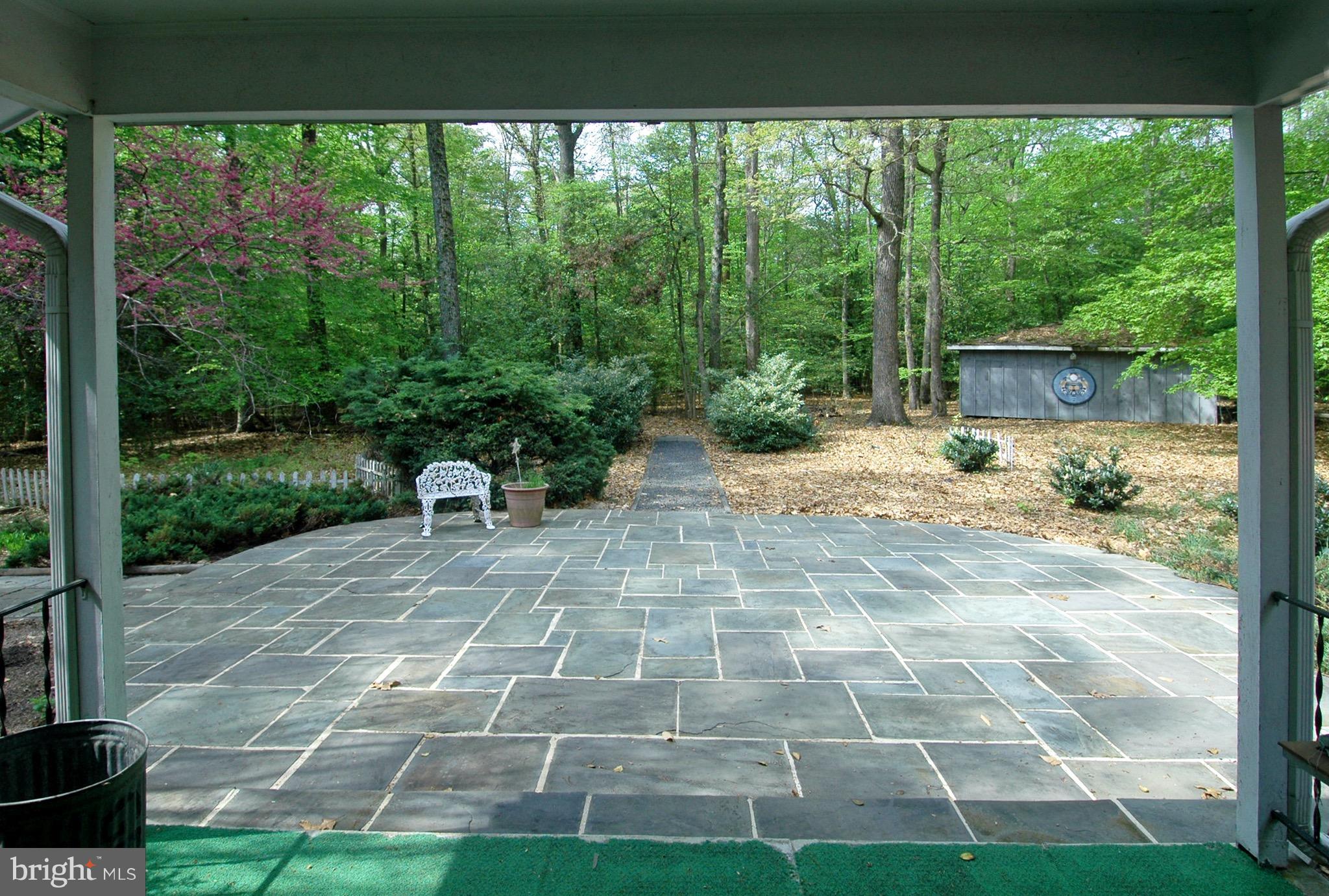 14911 West Auburn Road Accokeek, MD 20607 - Photo 6 of 30 a view of a backyard with plants and garden