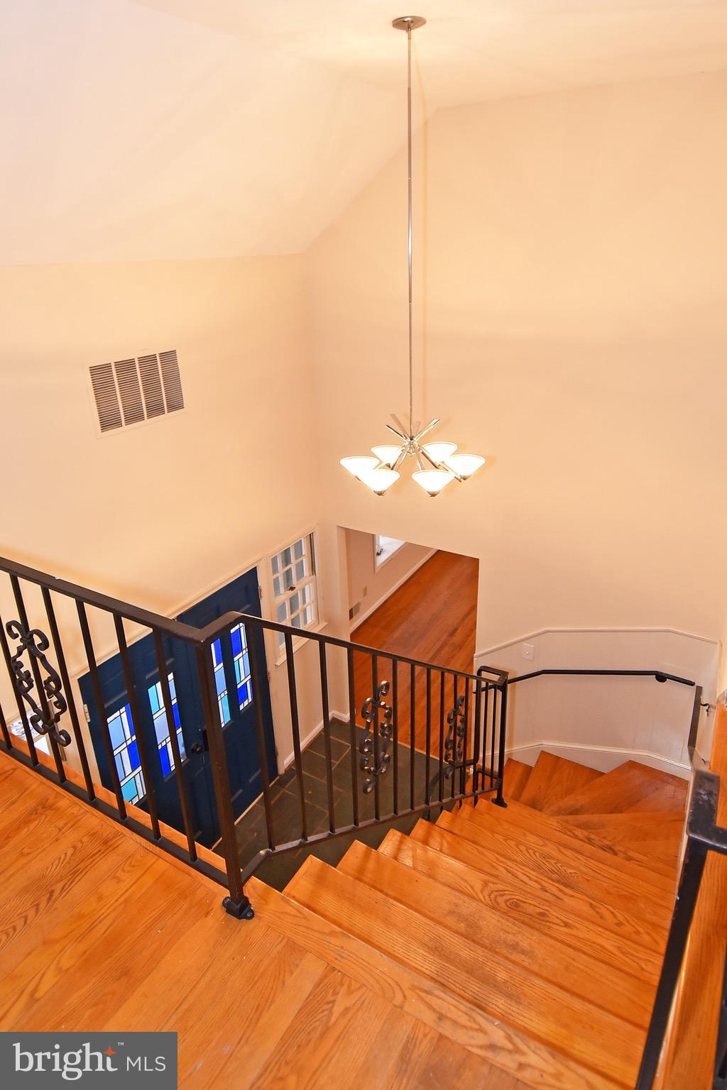 14911 West Auburn Road Accokeek, MD 20607 - Photo 10 of 30 a bedroom with a bed and the view of chandelier