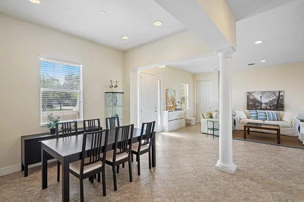 a living room with furniture and a table