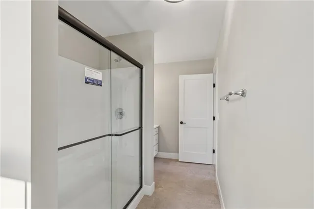 a view of a refrigerator in kitchen