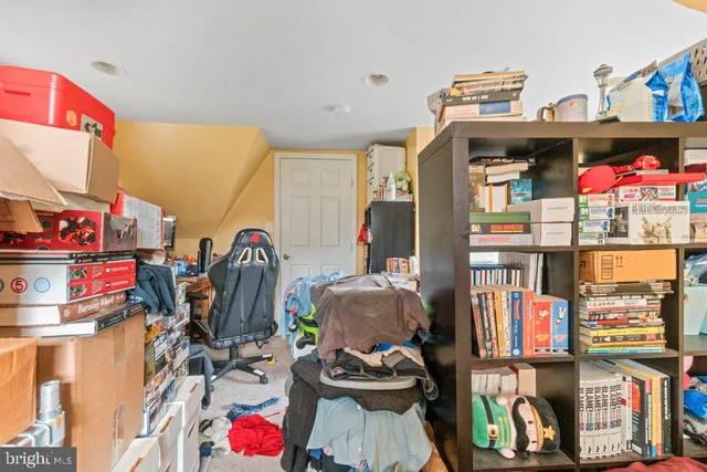 a store room with lots of different colored cloths