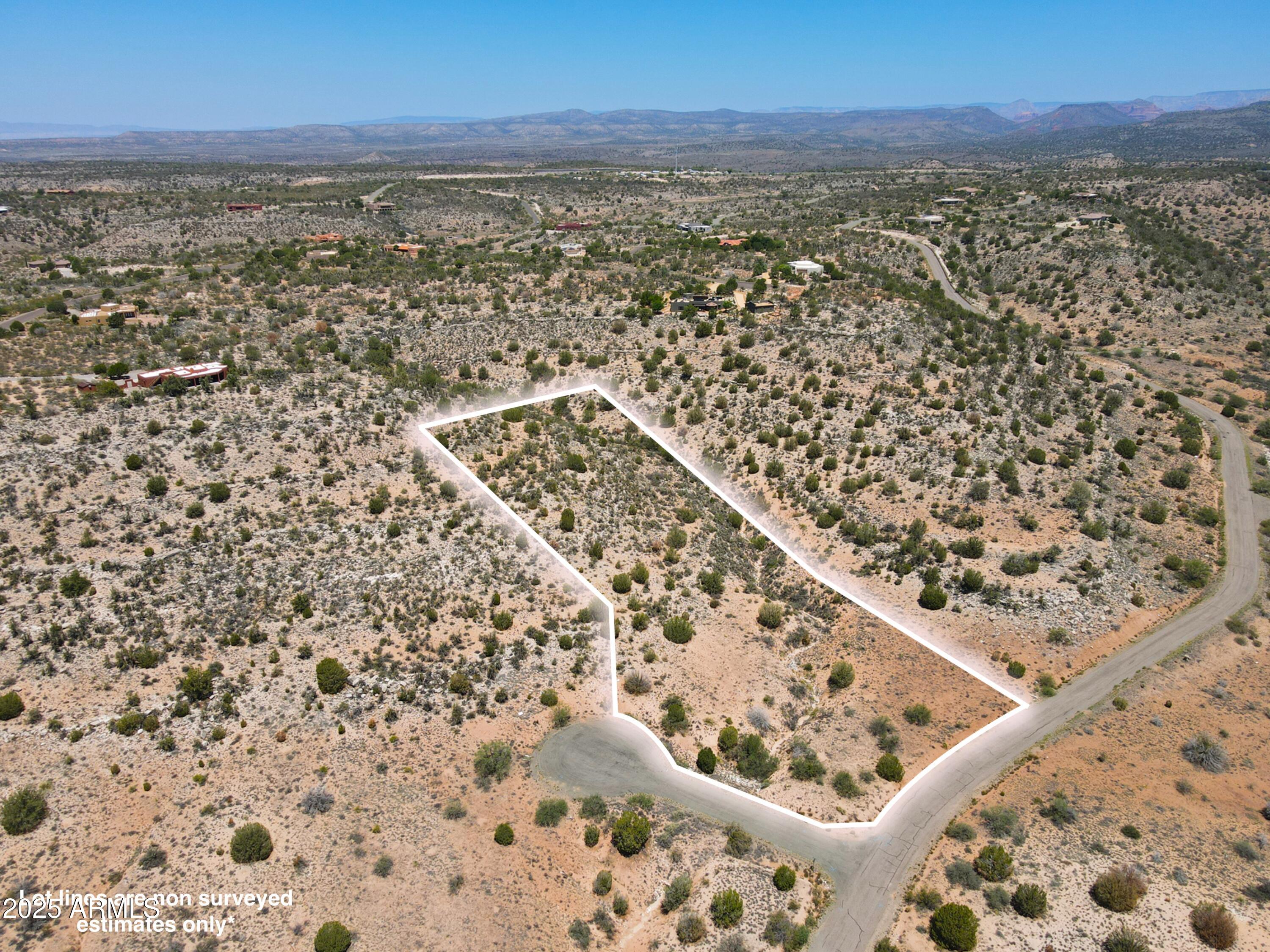 4890 North Falcon View Drive, Unit 154 Rimrock, AZ 86335 - Photo 6 of 9 an aerial view of residential houses with outdoor space