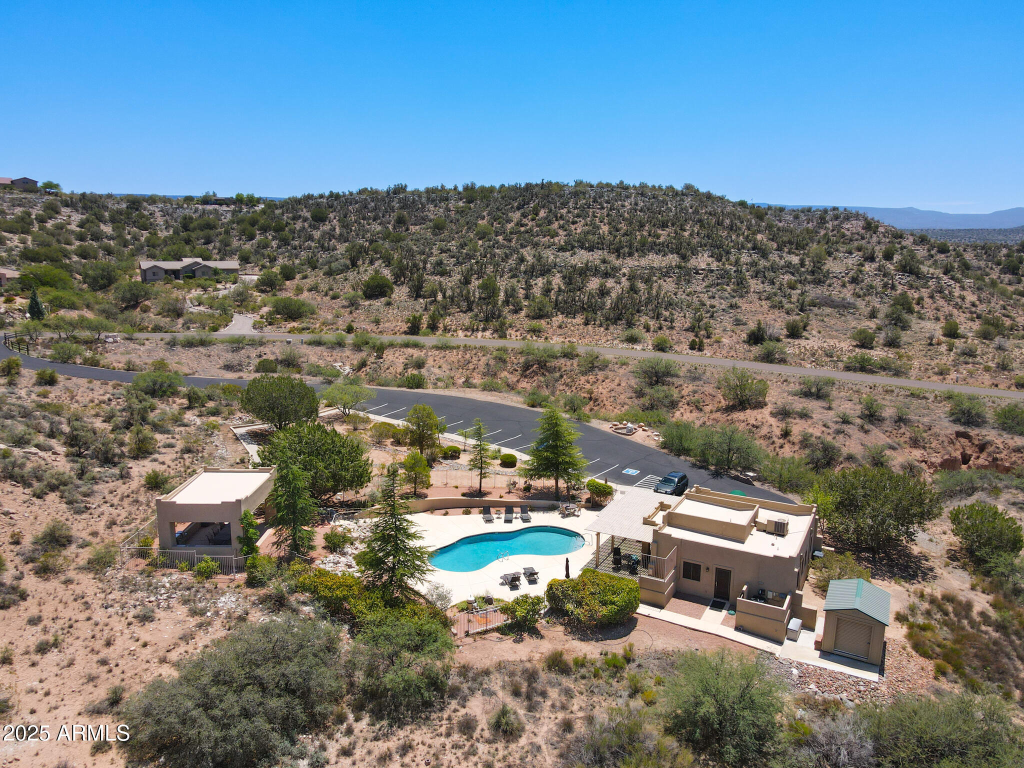4890 North Falcon View Drive, Unit 154 Rimrock, AZ 86335 - Photo 8 of 9 an aerial view of a house with a yard