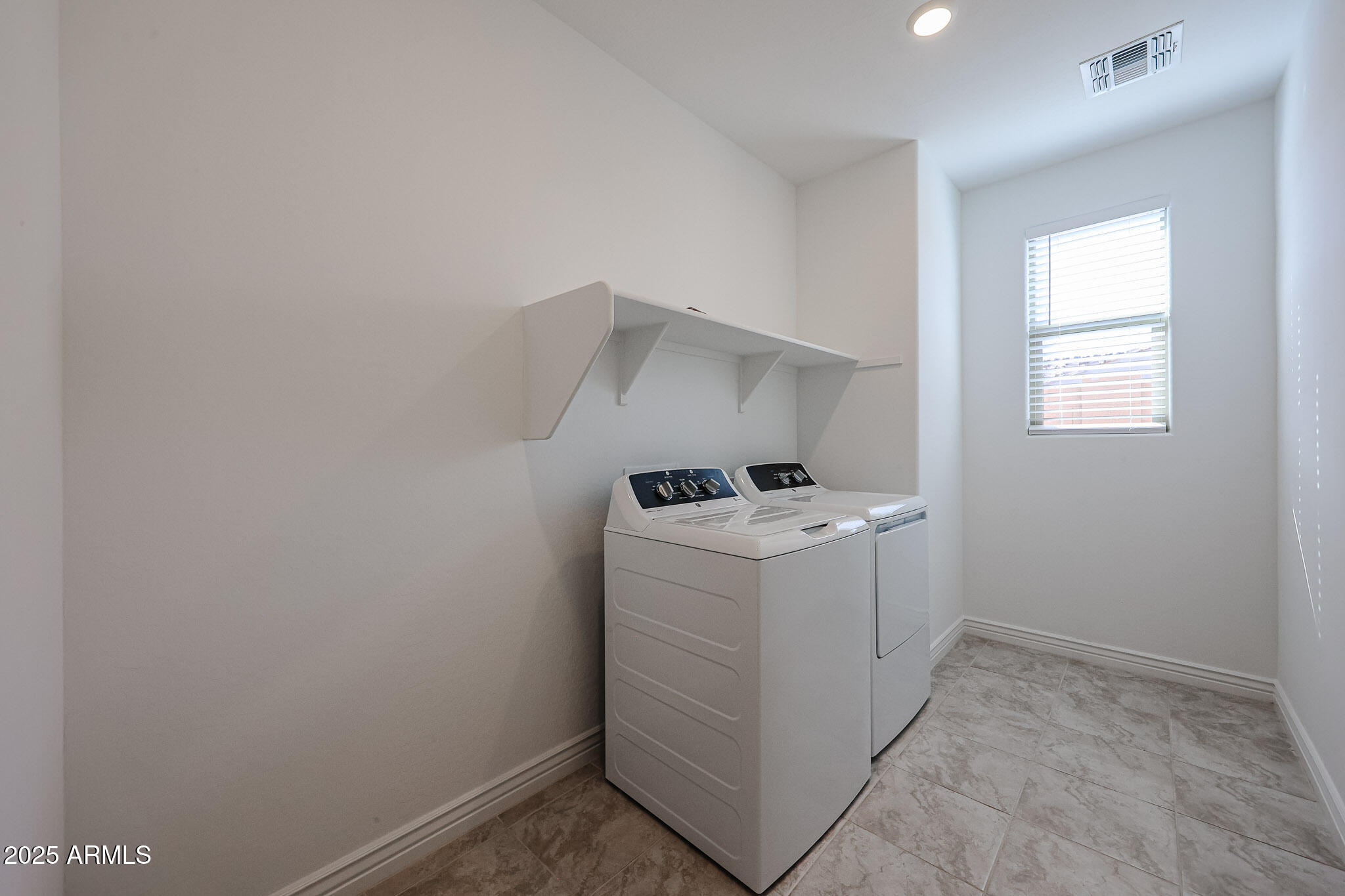 25128 North 171st Avenue Surprise, AZ 85387 - Photo 19 of 22 a utility room with dryer and washer