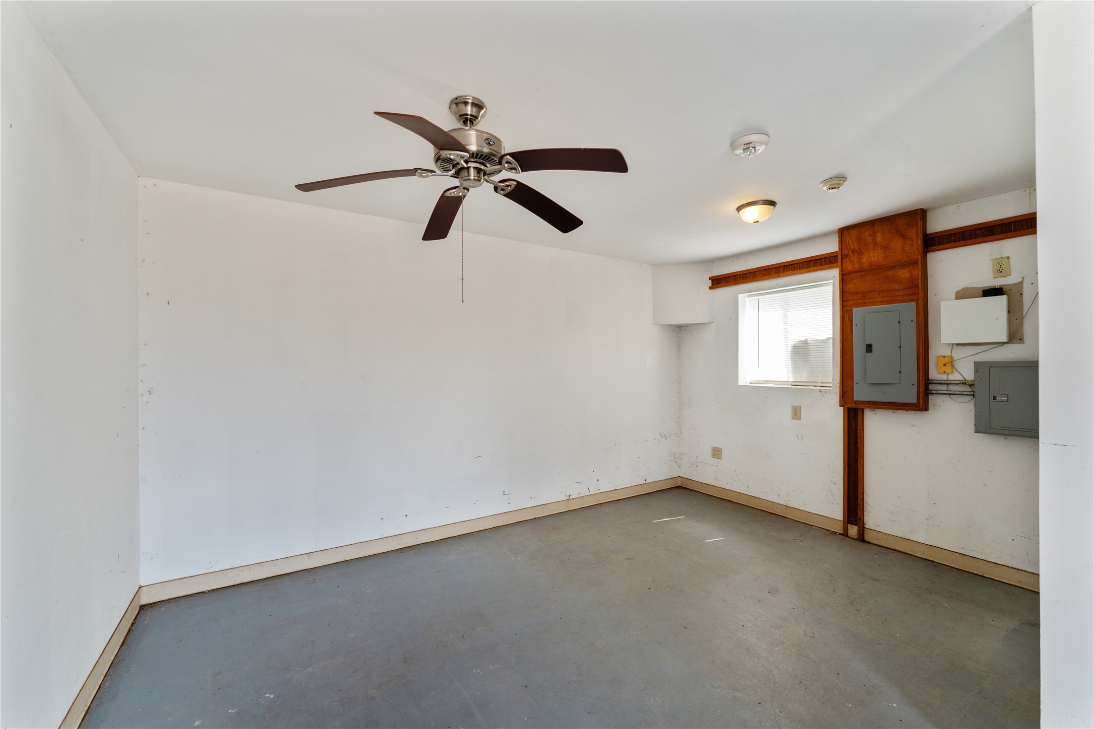 1585 Patton Road Rosenberg, TX 77471 - Photo 30 of 36 wooden floor in an empty room with a window