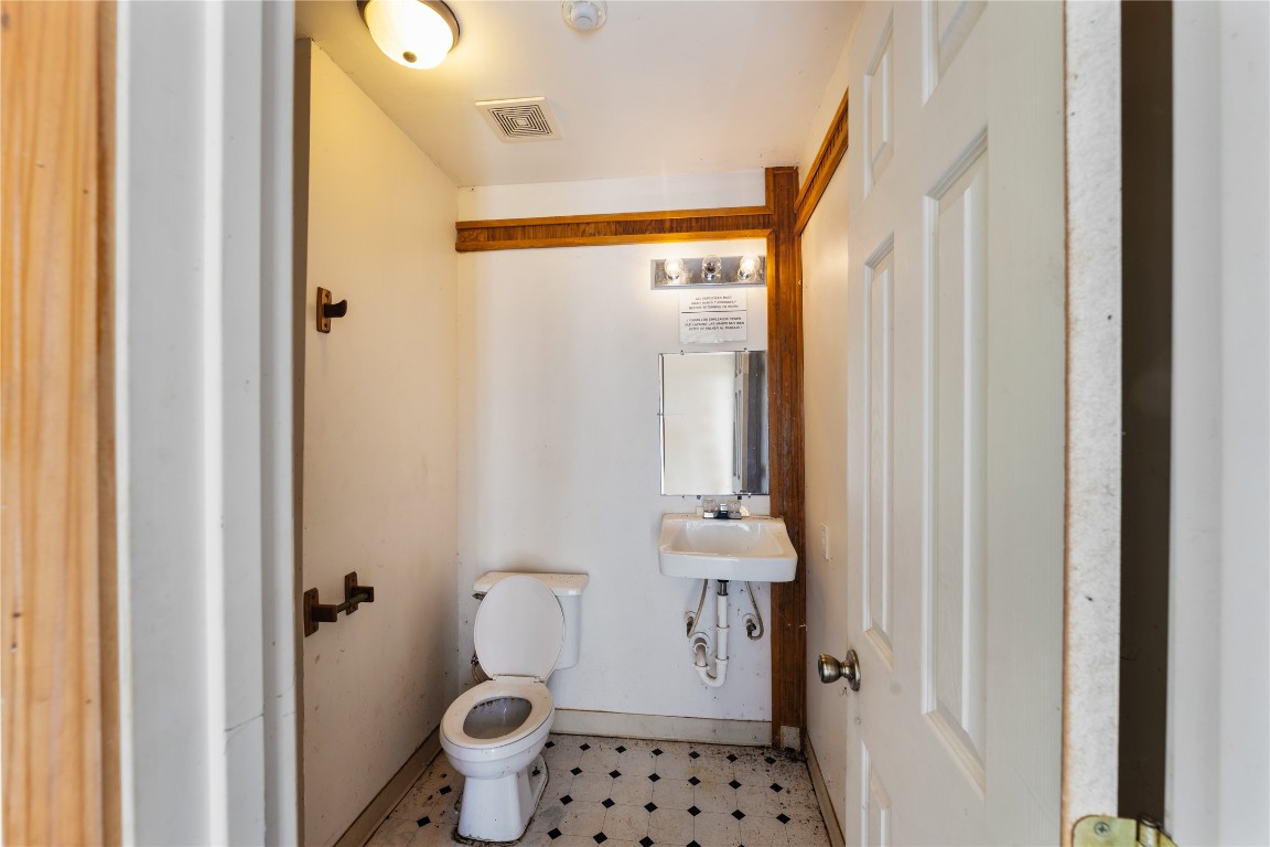1585 Patton / Tx-10 Spur Rosenberg, TX 77471 - Photo 34 of 36 a bathroom with a toilet and a shower
