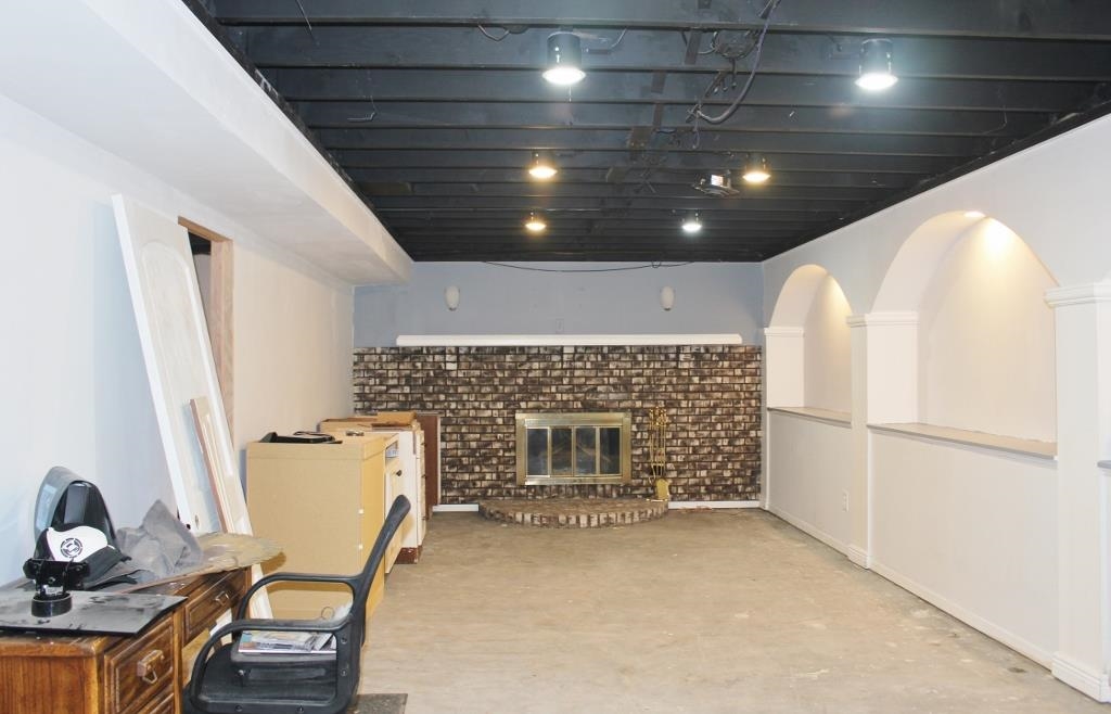 2870 Karr Road Belvidere, IL 61008 - Photo 12 of 22 a view of kitchen with furniture and a fireplace