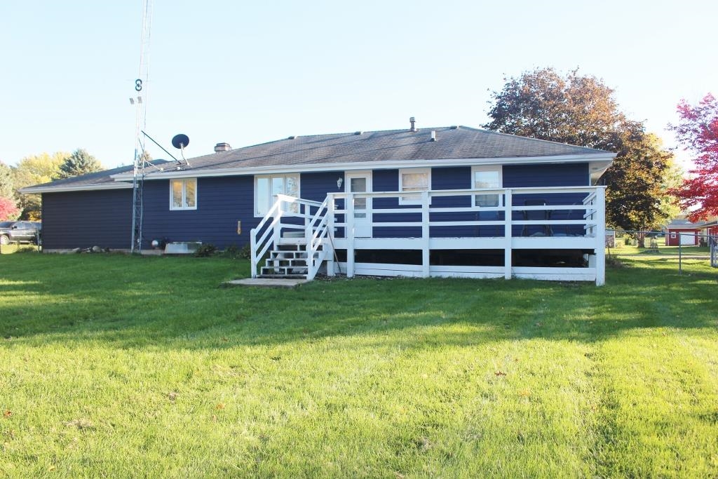 2870 Karr Road Belvidere, IL 61008 - Photo 20 of 22 a front view of a house with garden