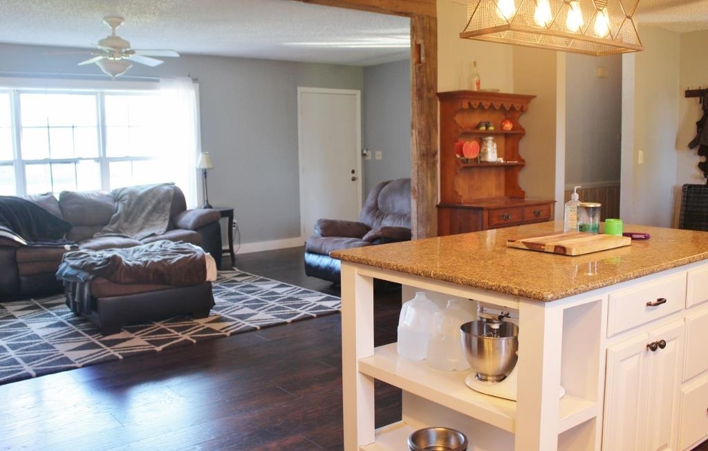 2870 Karr Road Belvidere, IL 61008 - Photo 6 of 22 a living room with a couch and a table