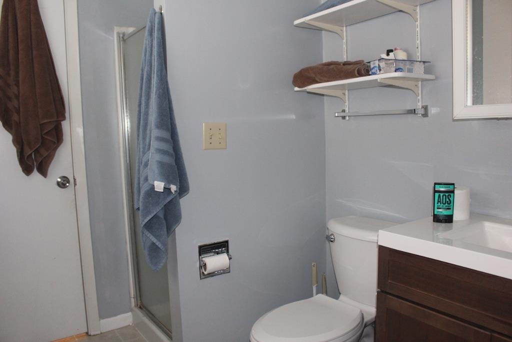 2870 Karr Road Belvidere, IL 61008 - Photo 8 of 22 a bathroom with a sink toilet and shower