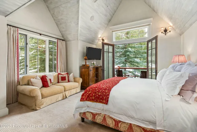 a room with pool table and furniture