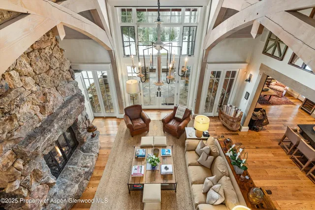 a front view of a house with outdoor seating