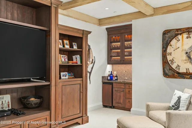 a bathroom with a double vanity sink toilet mirror and bathtub