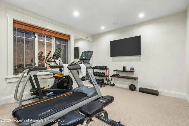 a bathroom with a tub and shower