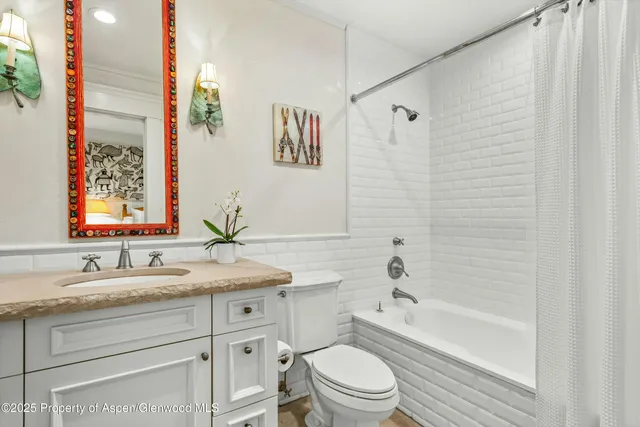 a kitchen with stainless steel appliances granite countertop a stove and a microwave