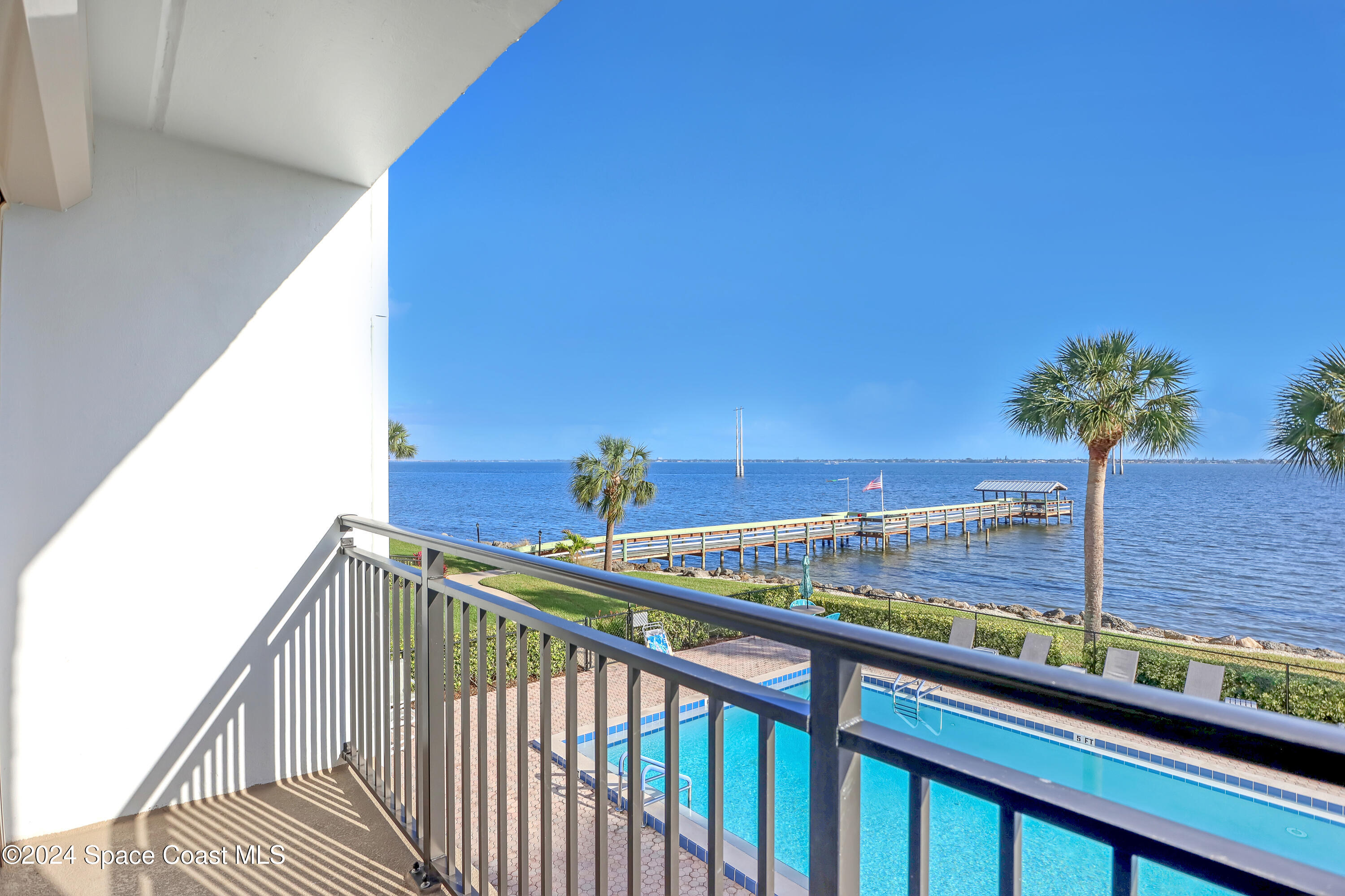 3901 Dixie Highway Northeast, Unit 209 Palm Bay, FL 32905 - Photo 23 of 49 a view of a balcony and an ocean view