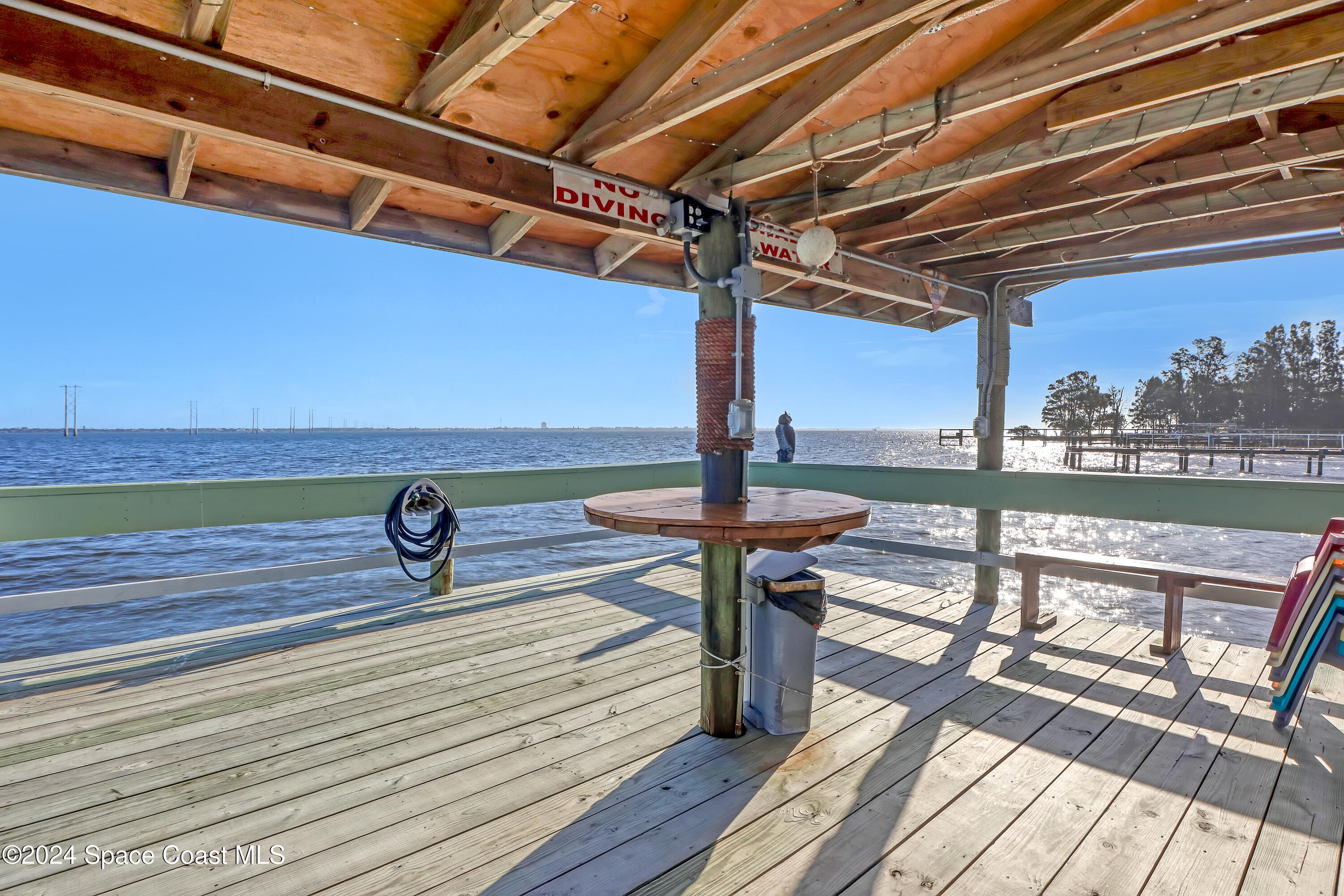 3901 Dixie Highway Northeast, Unit 209 Palm Bay, FL 32905 - Photo 24 of 49 a view of a roof deck with a patio