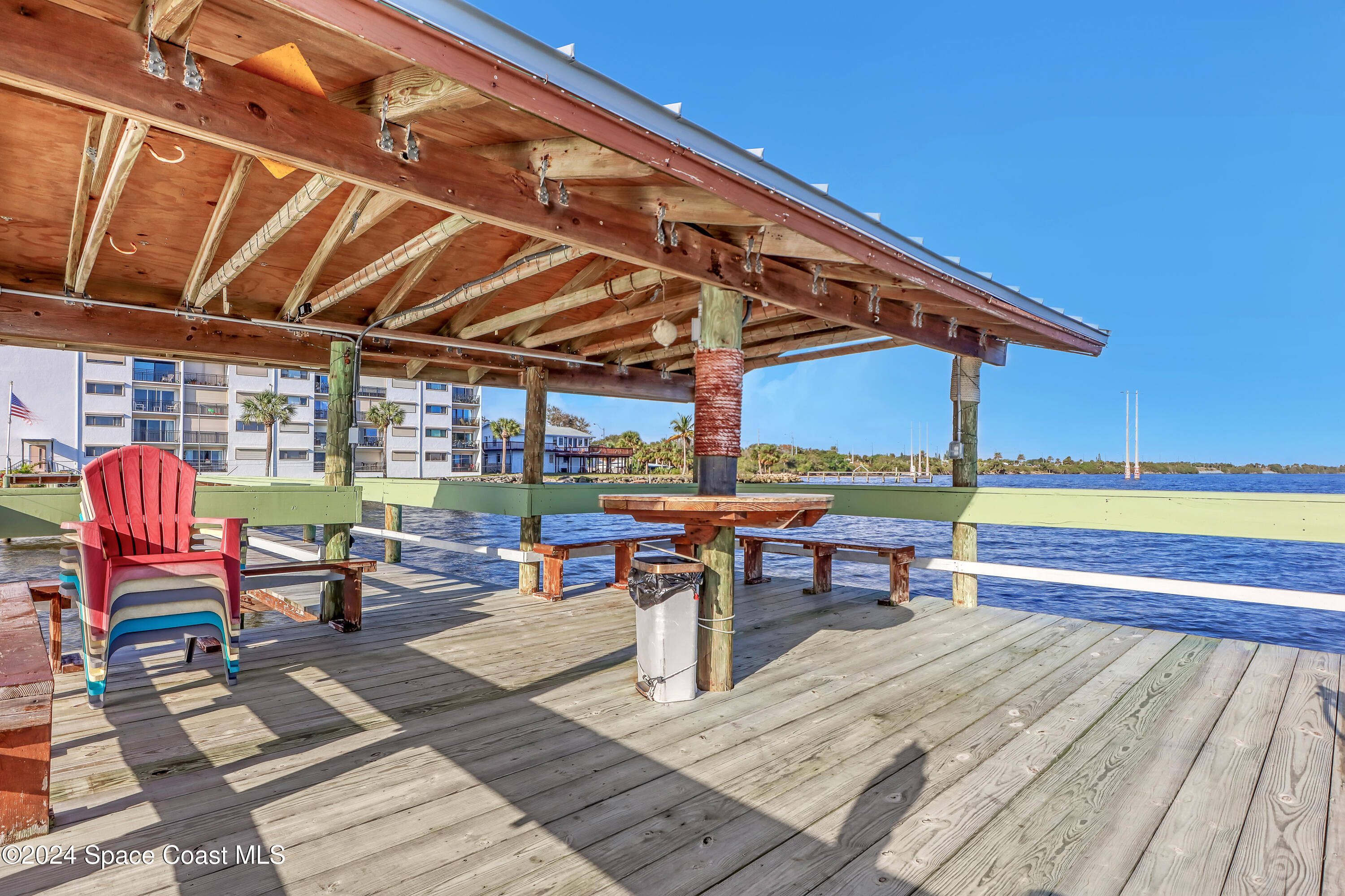3901 Dixie Highway Northeast, Unit 209 Palm Bay, FL 32905 - Photo 25 of 49 a view of a chairs and table in the terrace