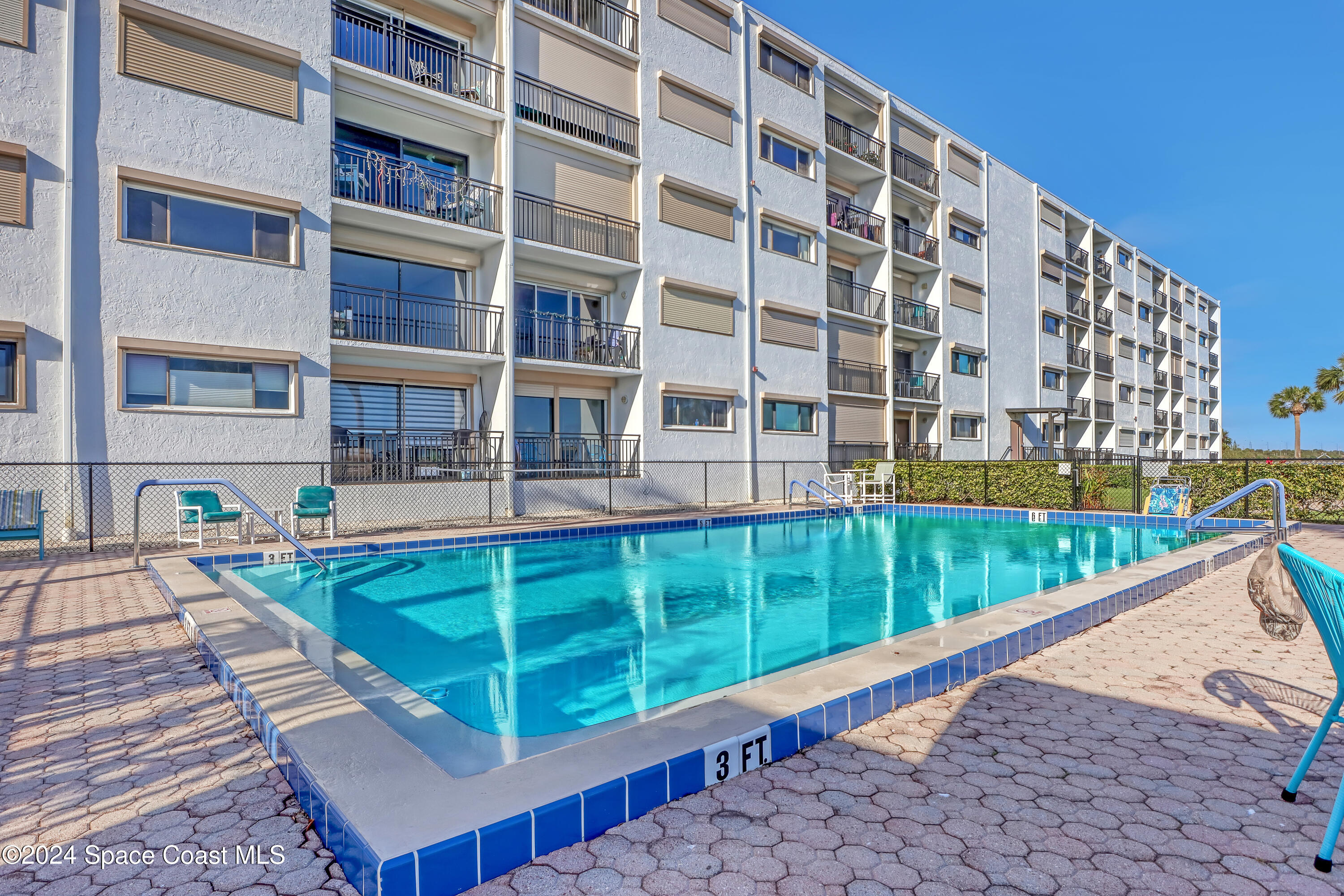 3901 Dixie Highway Northeast, Unit 209 Palm Bay, FL 32905 - Photo 41 of 49 a view of a building from a balcony