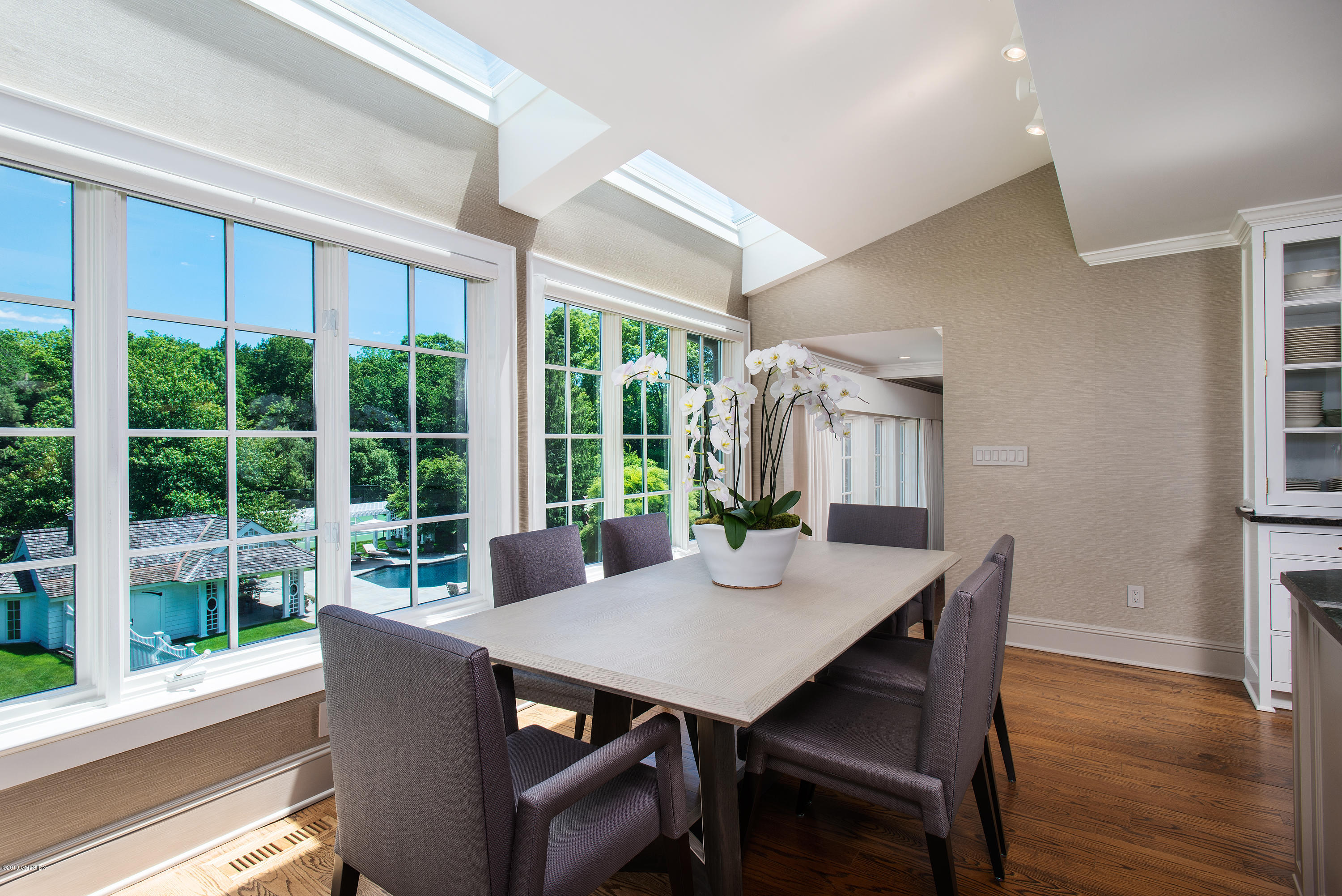 487 Stanwich Road Greenwich, CT 06831 - Photo 8 of 42 a view of a dining room with furniture window and wooden floor