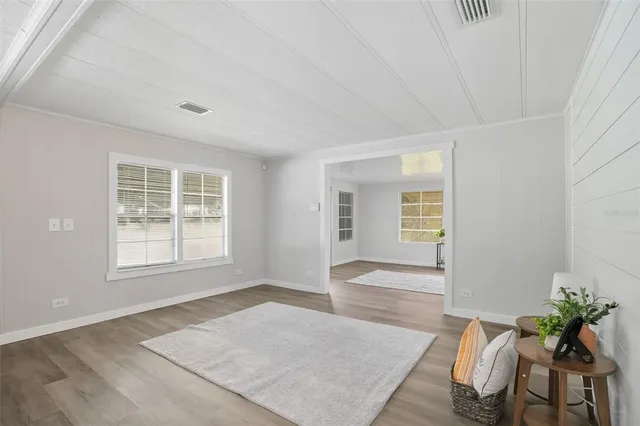 a kitchen with refrigerator a stove and a sink