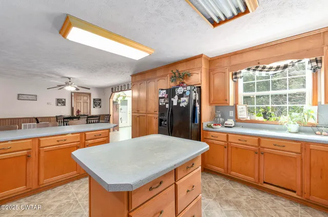 a dining room with furniture and windows