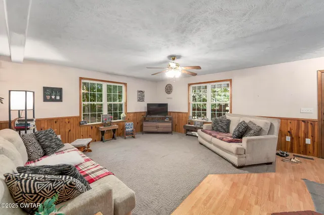 a bathroom with a sink a mirror a vanity and a shower
