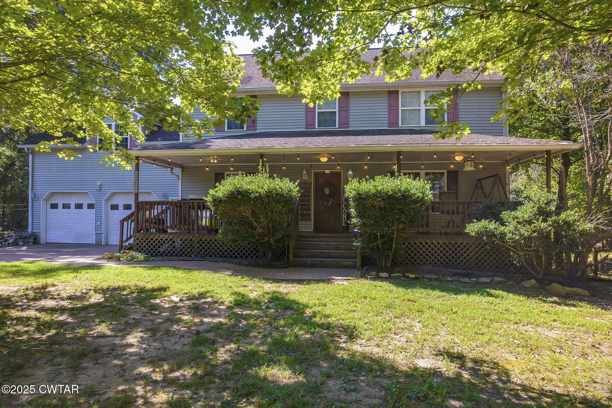 50 Braund Road Finger, TN 38334 - Photo 2 of 65 a view of a house with backyard garden and swimming pool