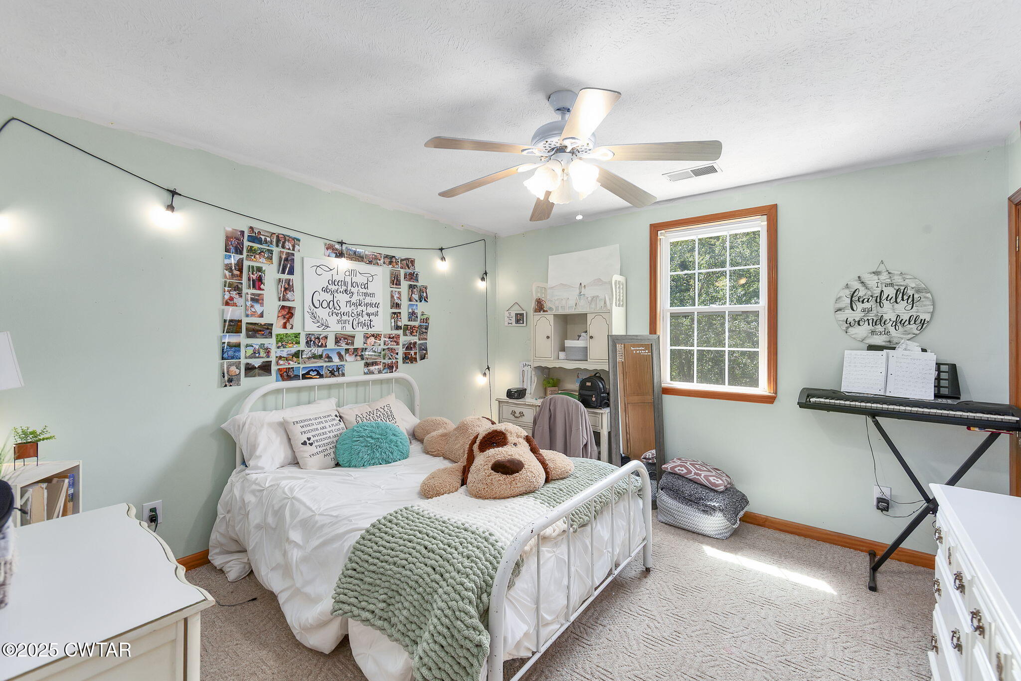50 Braund Road Finger, TN 38334 - Photo 26 of 65 a bedroom with a bed gym equipment and a large window