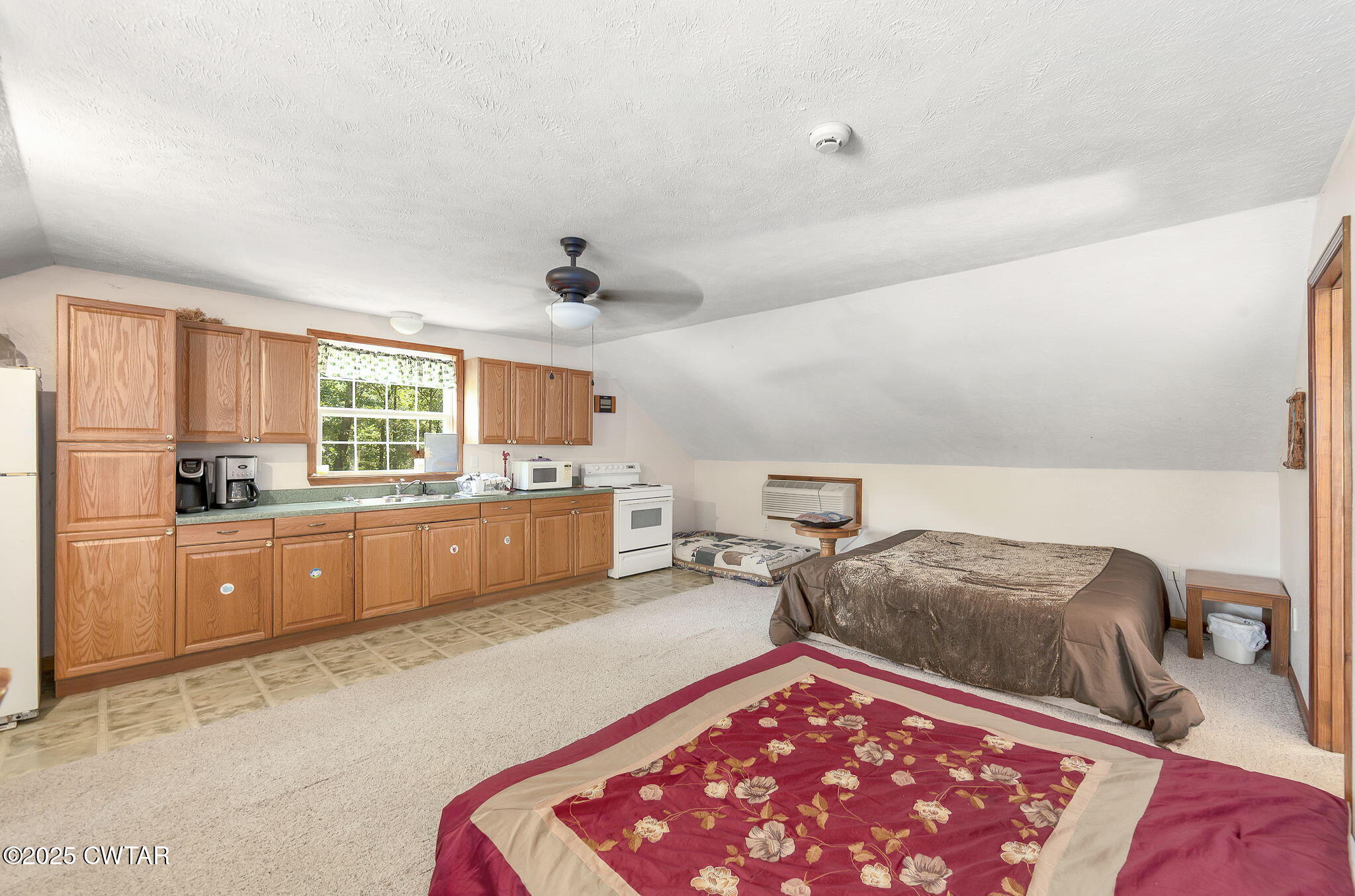 50 Braund Road Finger, TN 38334 - Photo 34 of 65 a bed room with a bed and a chair