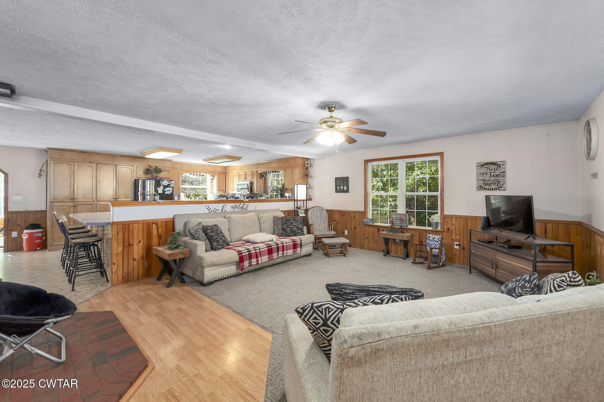 50 Braund Road Finger, TN 38334 - Photo 4 of 65 a living room with furniture and a chandelier