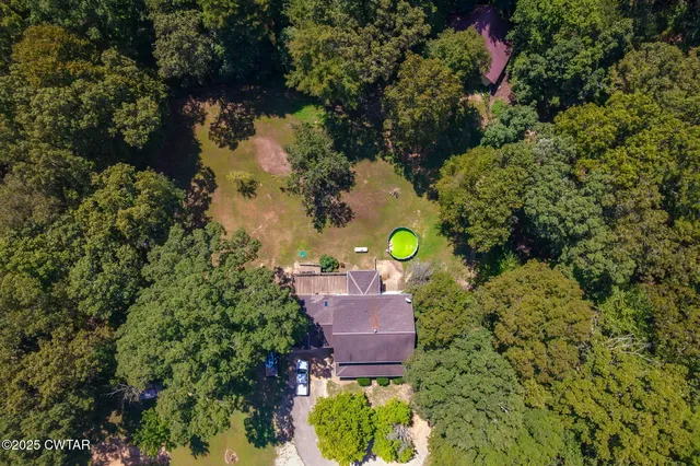 a view of a yard with an outdoor space
