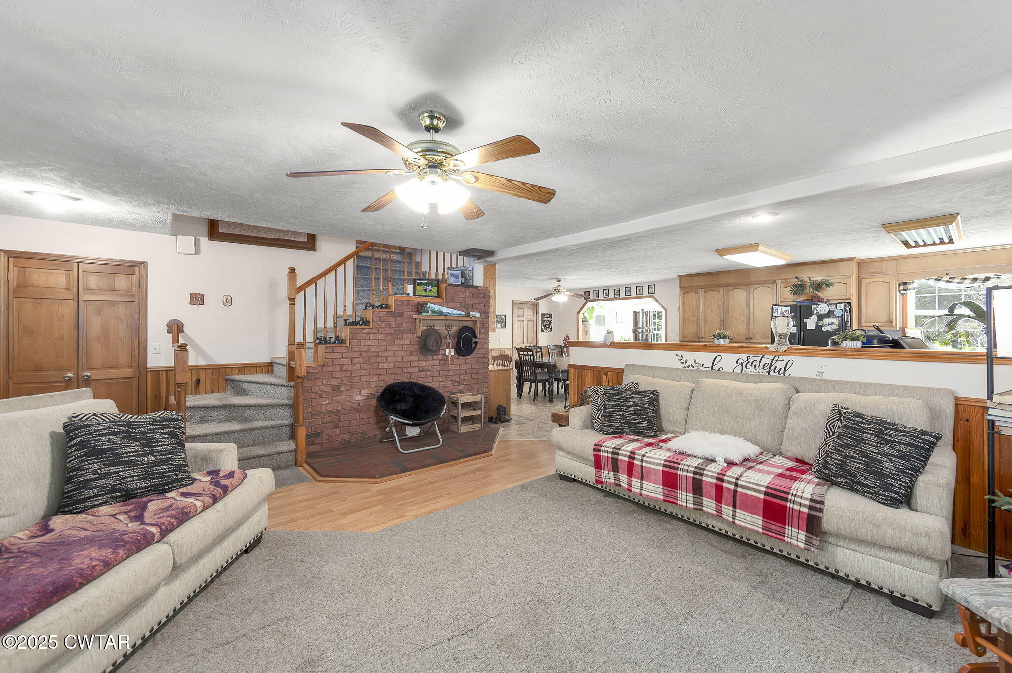 50 Braund Road Finger, TN 38334 - Photo 5 of 65 a living room with furniture and a fireplace