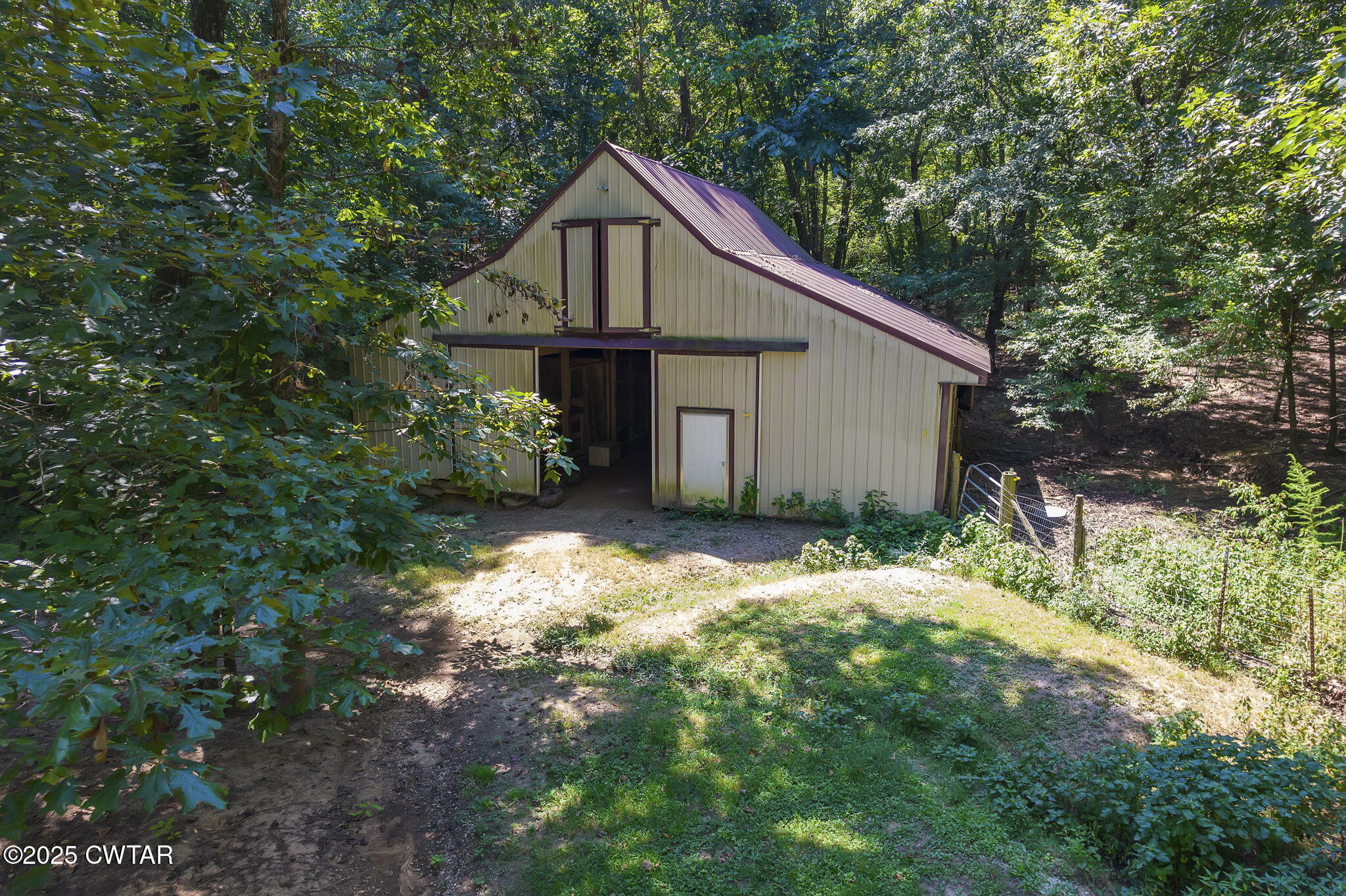 50 Braund Road Finger, TN 38334 - Photo 65 of 65 a view of a house with yard and plants