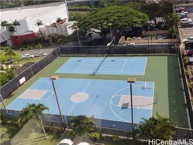 a swimming pool with some potted plants