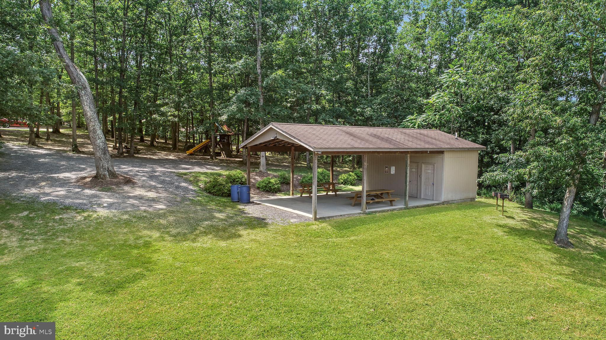 15 Meadow Way Ridgeley, WV 26753 - Photo 7 of 8 Community Beach picnic area