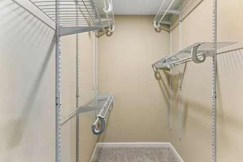 a view of small space with racks on the wall