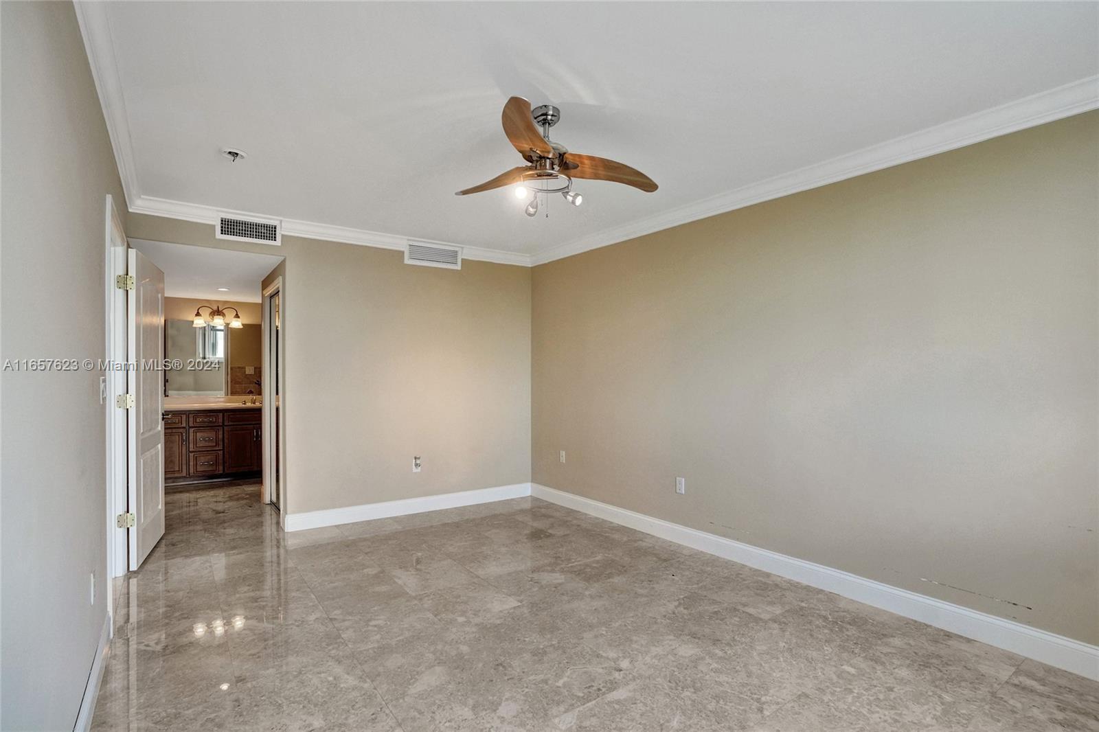 500 Bayview Drive, Unit PH20 Sunny Isles Beach, FL 33160 - Photo 23 of 41 an empty room with closet and windows