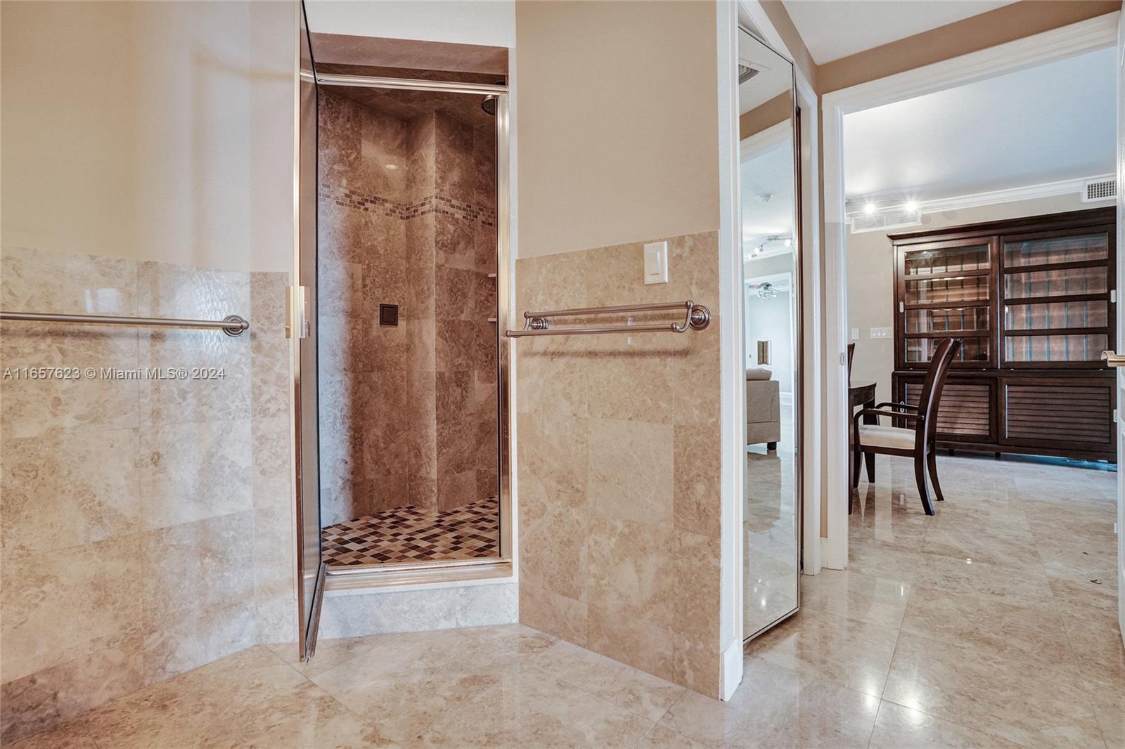 500 Bayview Drive, Unit PH20 Sunny Isles Beach, FL 33160 - Photo 29 of 41 a view of a hallway and dining room with furniture