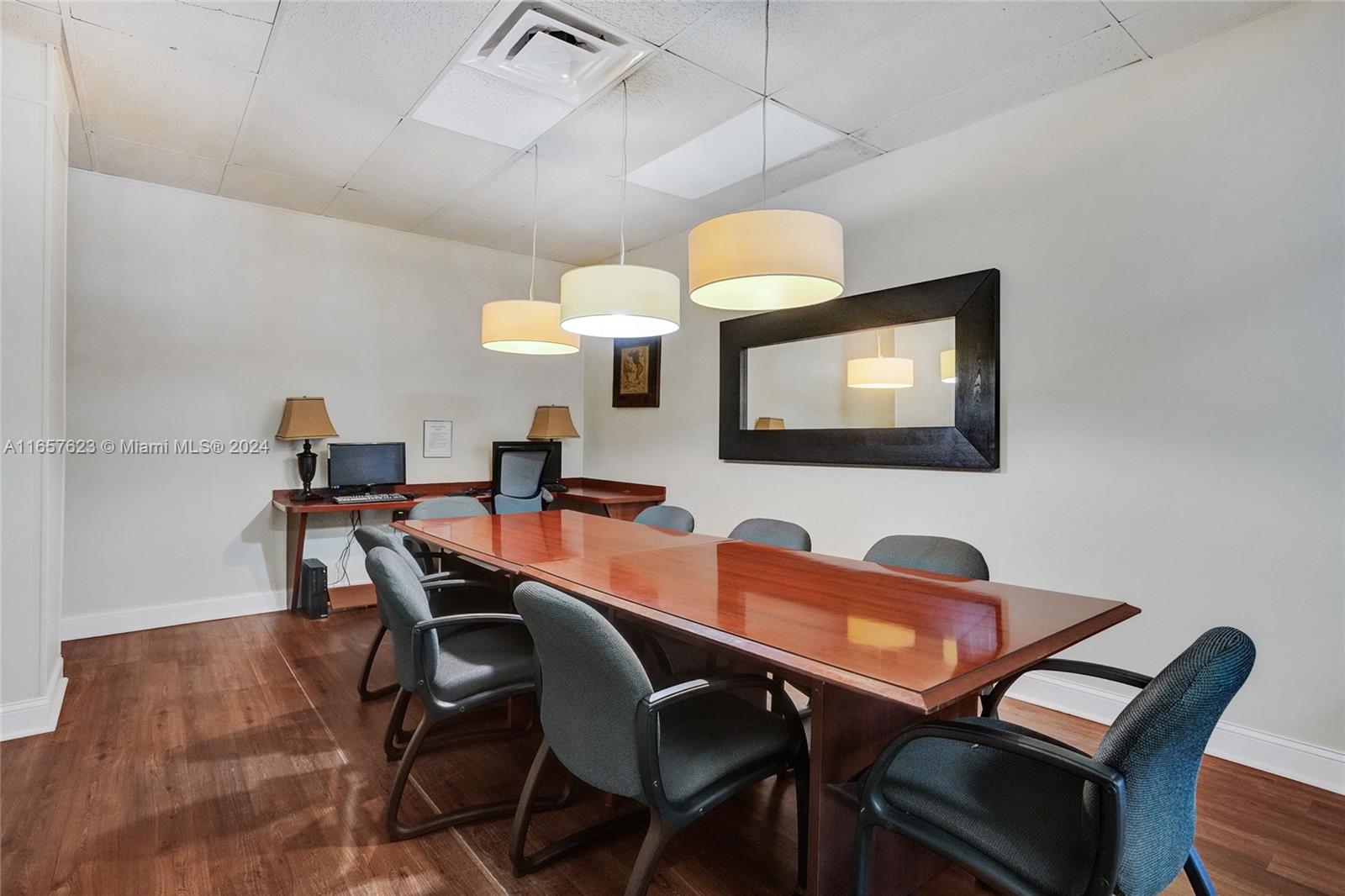 500 Bayview Drive, Unit PH20 Sunny Isles Beach, FL 33160 - Photo 40 of 41 a view of a dining room and a table and chairs