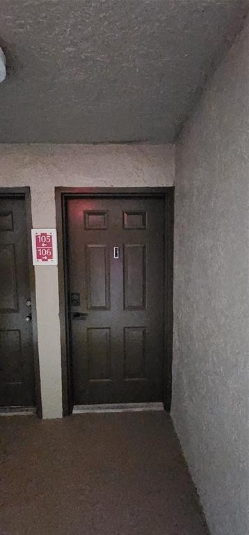 5005 Wiles Road, Unit 106 Coconut Creek, FL 33073 - Photo 2 of 19 a view of empty room